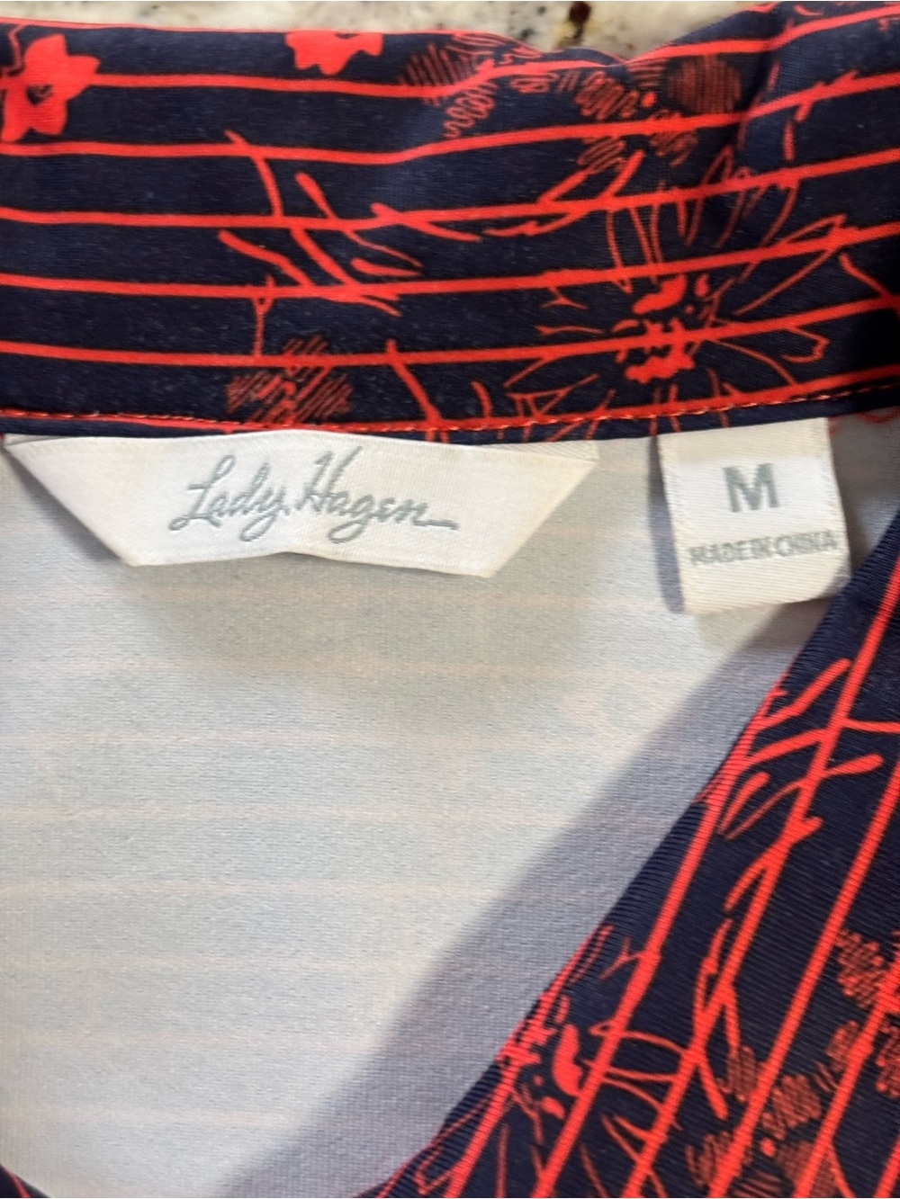 Lady Hagen Navy Polo with Coral Floral Stripe Pattern - Picture 4 of 4